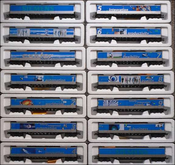 ROCO 14-piece wagon set: Siemens EXIDER carrier wagons, H0 gauge, complete series, pre owned and in as new condition.