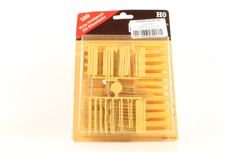 Faller 180589 HO Scale Lumber Assortment. Features: Logs, rafters, boards, wood stacks, splinter wood