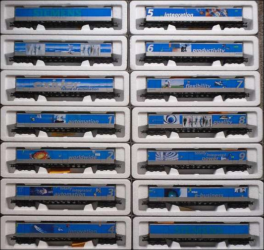 ROCO 14-piece wagon set: Siemens EXIDER carrier wagons, H0 gauge, complete series, pre owned and in as new condition.