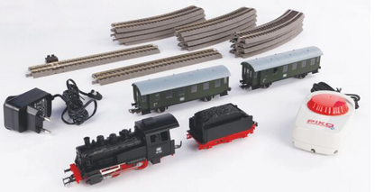 PRE-OWNED PIKO Starter Set Passenger Train DB with Steam loco + tender, PIKO A-Track w. Railbed Item Number: 57112